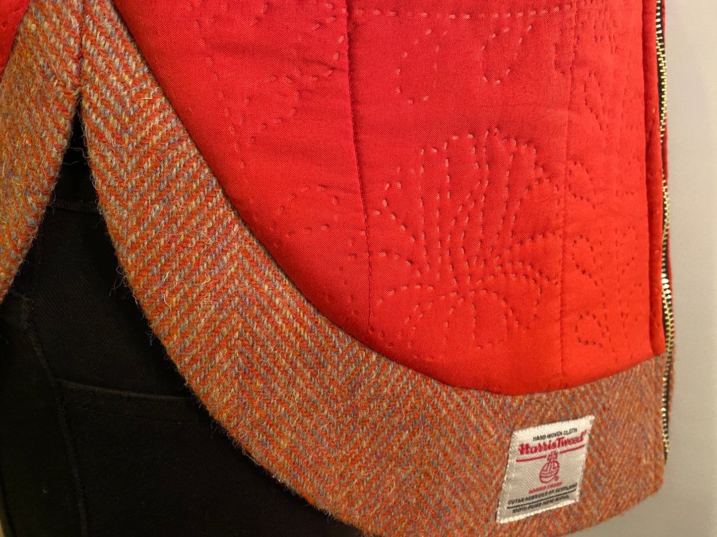 Rudraksha Jacket. Quilted front with Orange Harris Tweed