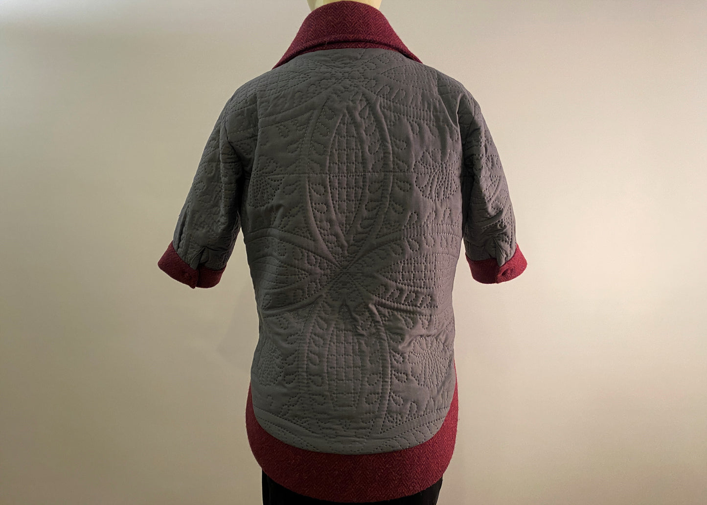 Rudraksha Jacket. Quilted Gray front with Burgundy Harris Tweed